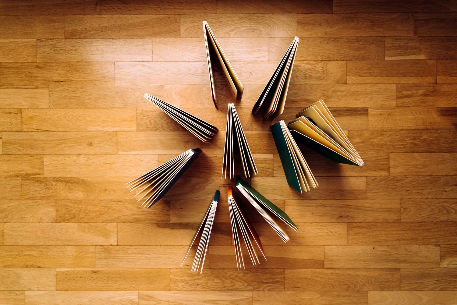 Books on a wooden floor