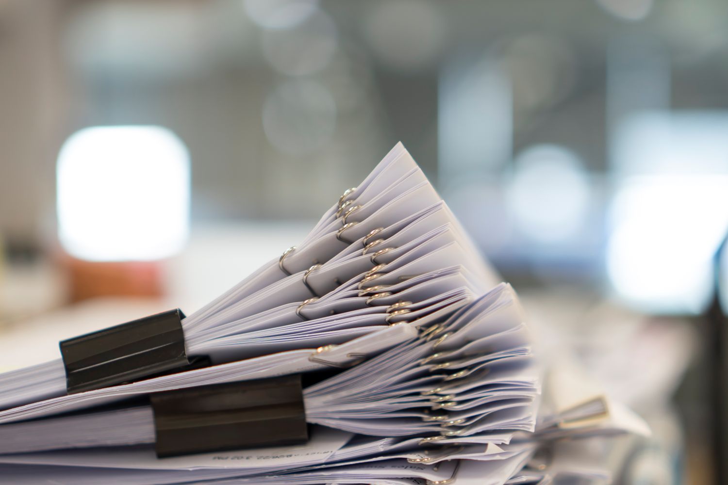 stack of contracts